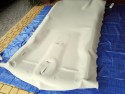 Częściowe przyklejenie materiału na podsufitce
