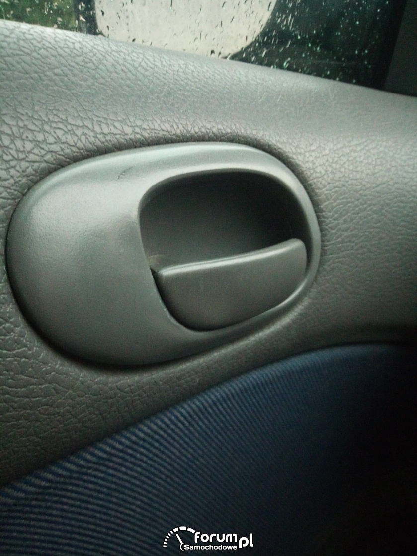 Klamka wewnętrzna lewa peugeot 206
