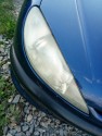 Lewy reflektor Peugeot 206